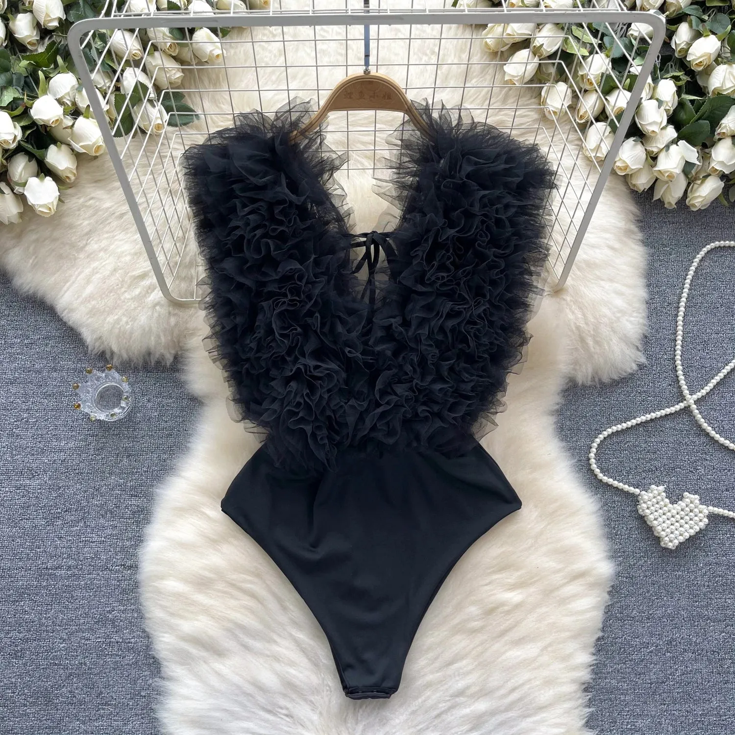 Bloom Boldly in Our 3D Floral Bodysuit